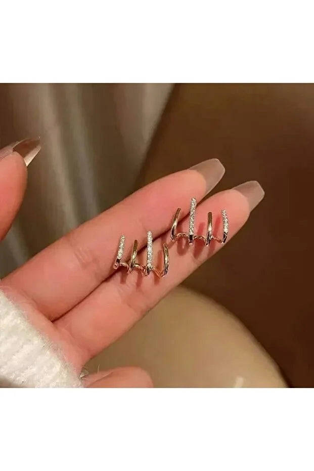 Boucles d’oreilles zircon argenté, créoles empilées, vue en main