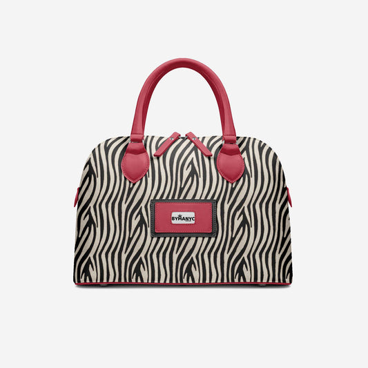 Sac cabas zébré noir et blanc, anses bordeaux, poche avant avec logo BYMANYC