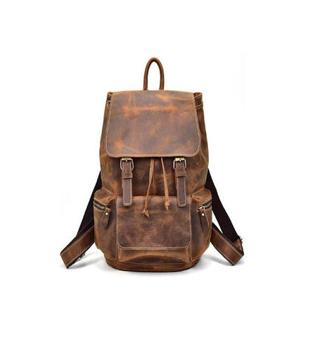 Sac à dos en cuir brun avec rabat avant et poches à sangles métalliques