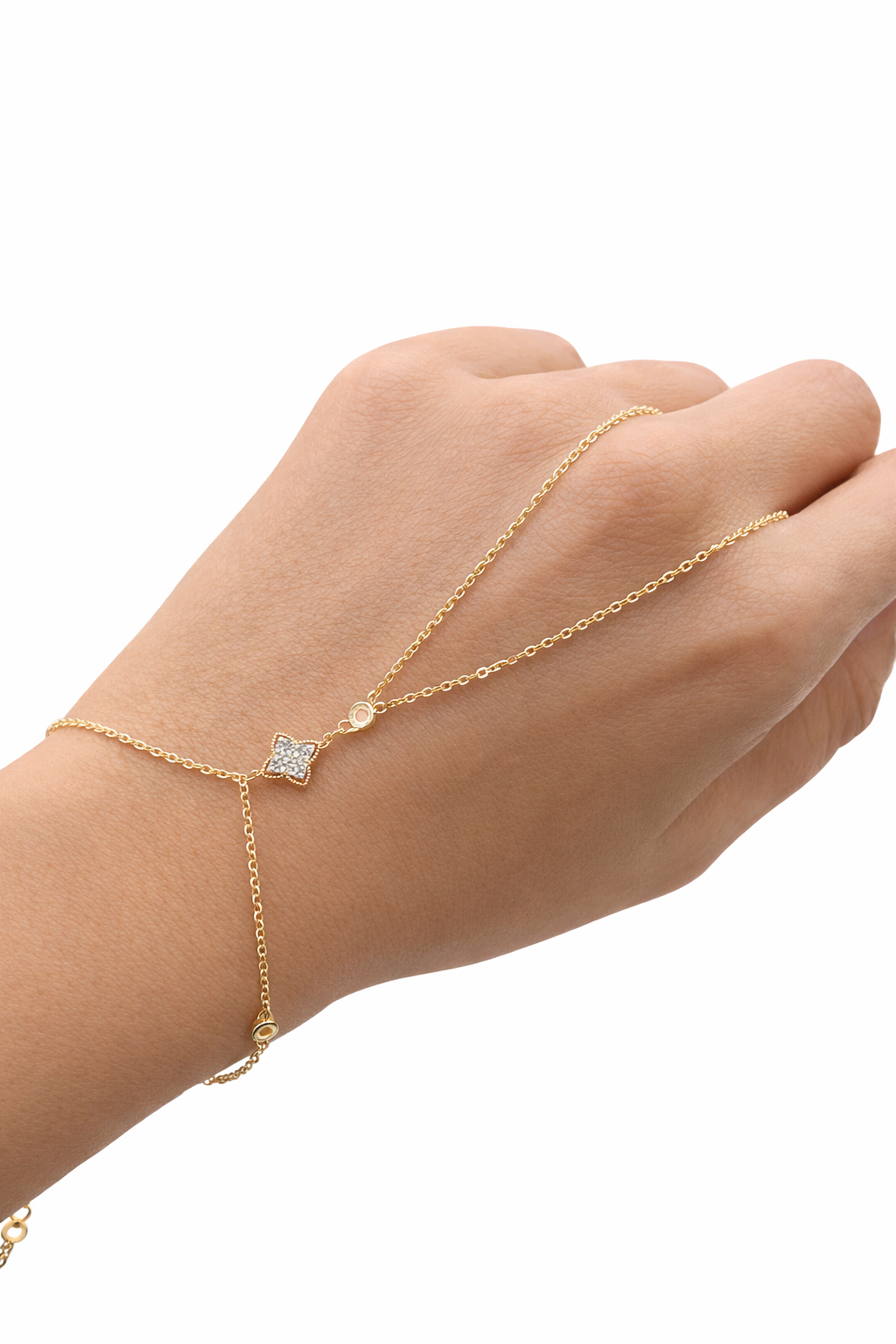 Bracelet chaîne dorée à petits motifs décoratifs sur fermoir à maillons
