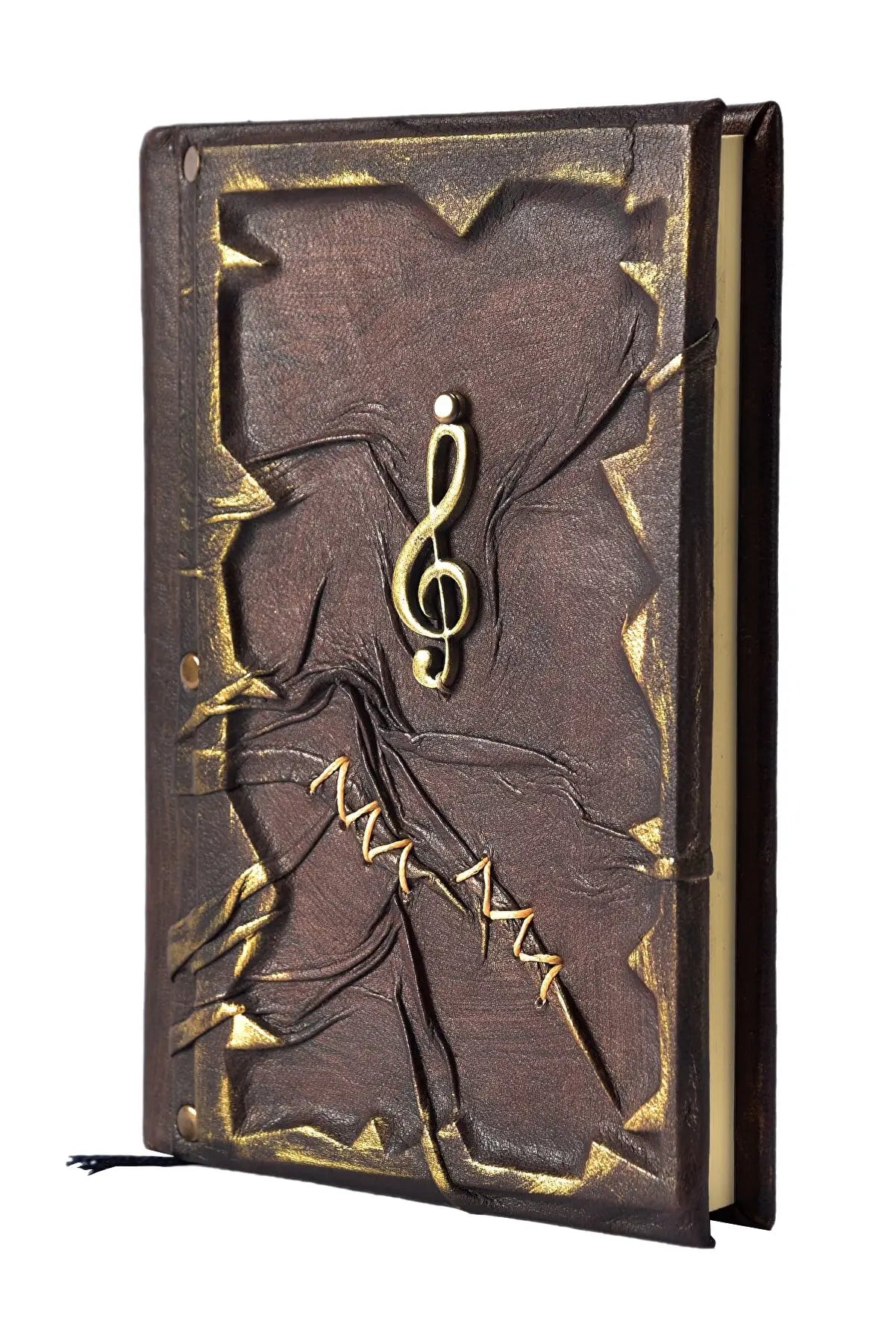 Carnet en cuir brun foncé, vue de trois-quarts, motif doré et clé de sol