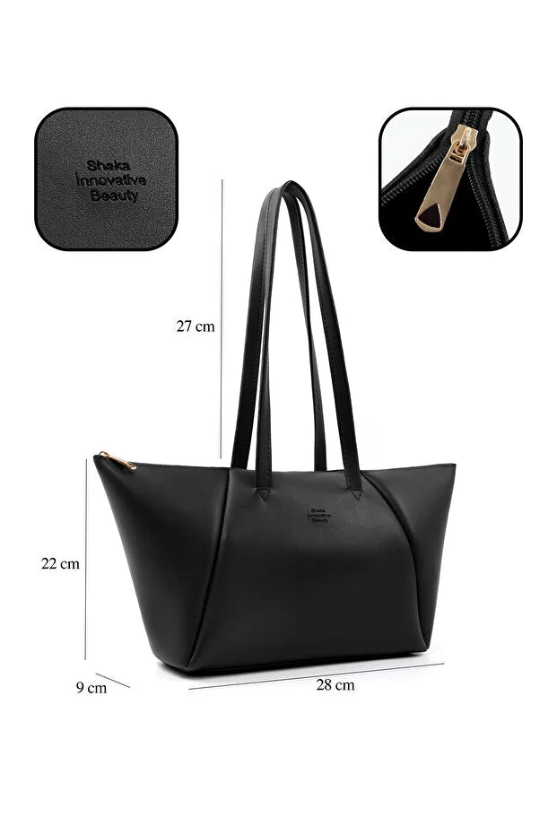 Sac cabas en faux cuir noir, étiquette logo et dimensions 28×27×22 cm.