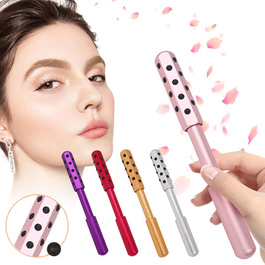 Rouleau de massage facial rose avec picots noirs, poignée compacte