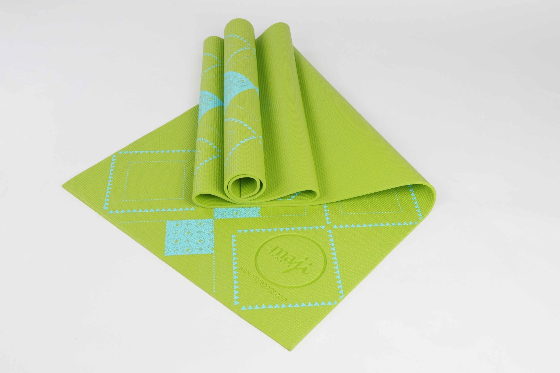Tapis de yoga imprimé PVC vert, enroulé, motifs géométriques et cercles