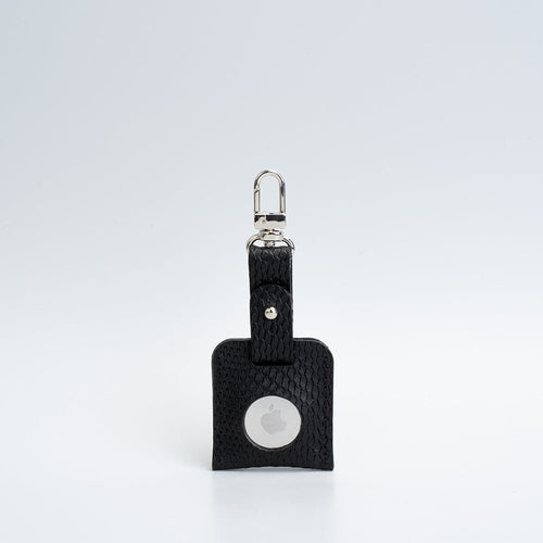 Porte-clés en cuir noir texturé avec mousqueton argenté et fenêtre ronde AirTag