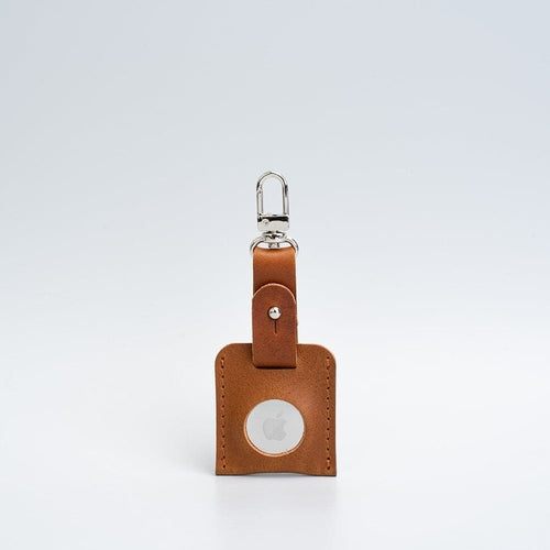 Porte-clés en cuir marron clair avec mousqueton argenté et fenêtre ronde AirTag