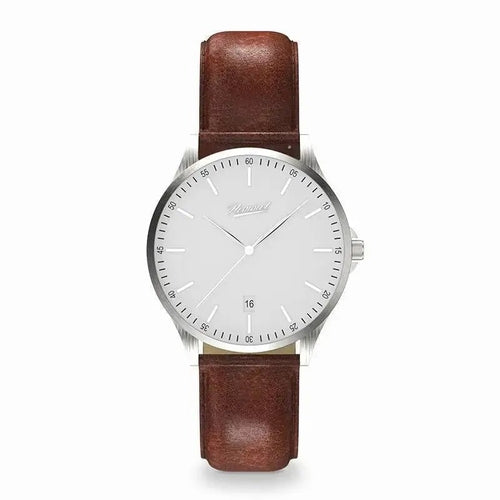 Montre H|Watch Série 2 cadran blanc, bracelet cuir brun, couronne latérale.